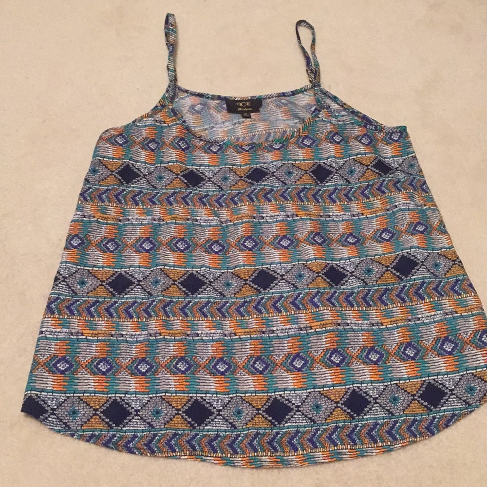 Blue, green, and orange patterned top